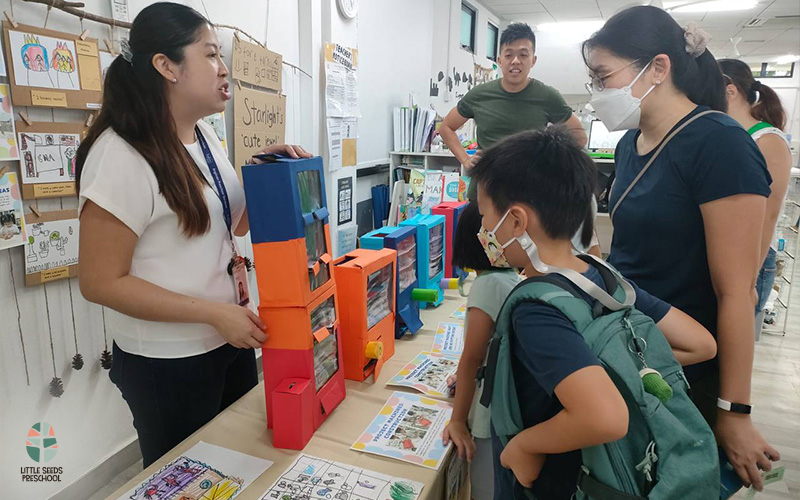 Preschool Teacher talking to Parent