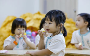 Little Seeds preschooler enjoying a healthy fruit snack.